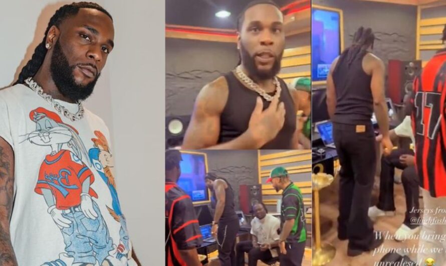 “Davido can’t do like that” – Reactions as Burna Boy destroys someone phone for trying to make video while playing his unreleased music (Watch)