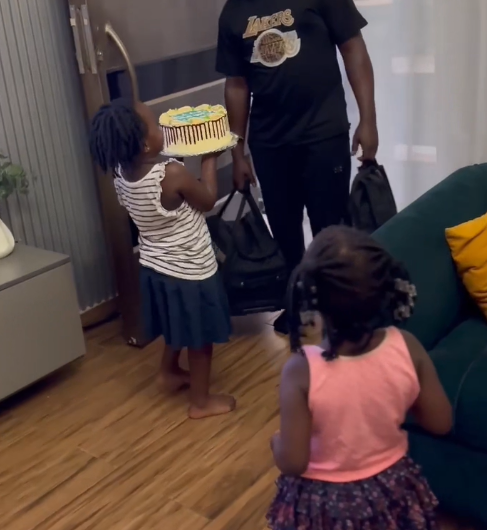 Heartwarming moment little girls welcomed their Daddy with a birthday surprise (WATCH)